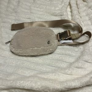 brand newf fleece everywhere belt bag still has tags